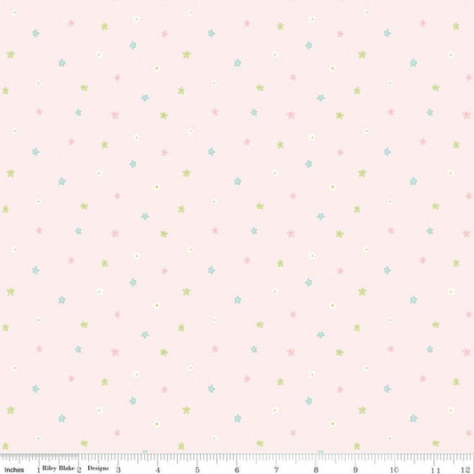 Image of Little Posies Ditsy Pink quilting cotton fabric by Cayla Naylor for Riley Blake Designs. Features stars on a pink background. Cute Little Fabric Shop.