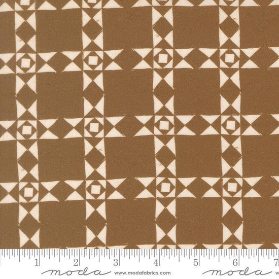 Image of Imprint Relics Umber quilting cotton fabric by Sewn By Amy Schelle for Moda Fabrics. Features a geometric pattern on a brown background. Cute Little Fabric Shop.