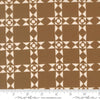 Image of Imprint Relics Umber quilting cotton fabric by Sewn By Amy Schelle for Moda Fabrics. Features a geometric pattern on a brown background. Cute Little Fabric Shop.