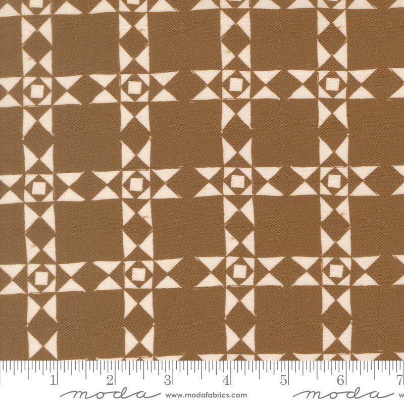 Image of Imprint Relics Umber quilting cotton fabric by Sewn By Amy Schelle for Moda Fabrics. Features a geometric pattern on a brown background. Cute Little Fabric Shop.