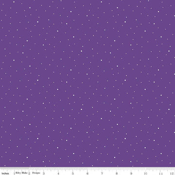 Image of Dapple Dot Iris quilting cotton fabric by The RBD Designers for Riley Blake Designs. Features polka dots on a purple background. Cute Little Fabric Shop.