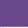 Image of Dapple Dot Iris quilting cotton fabric by The RBD Designers for Riley Blake Designs. Features polka dots on a purple background. Cute Little Fabric Shop.