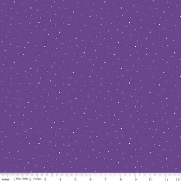 Image of Dapple Dot Iris quilting cotton fabric by The RBD Designers for Riley Blake Designs. Features polka dots on a purple background. Cute Little Fabric Shop.