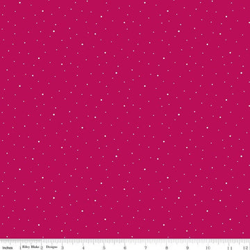 Image of Dapple Dot Magenta quilting cotton fabric by The RBD Designers for Riley Blake Designs. Features polka dots on a pink background. Cute Little Fabric Shop.