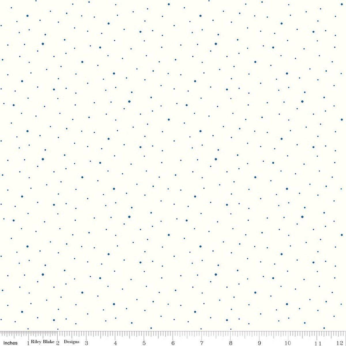 Image of Dapple Dot on Off White Denim quilting cotton fabric by The RBD Designers for Riley Blake Designs. Features polka dots on a cream background. Cute Little Fabric Shop.