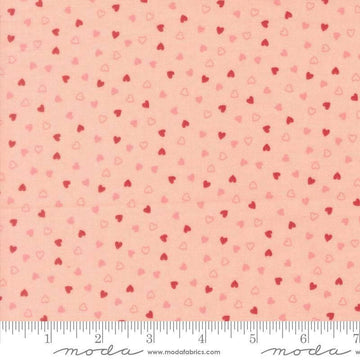 Image of Je Taime Sweetness Blush quilting cotton fabric by Stacy Iest Hsu for Moda Fabrics. Features hearts on a pink background. Cute Little Fabric Shop.