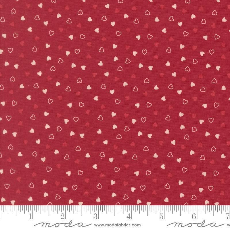 Image of Je Taime Sweetness Scarlet quilting cotton fabric by Stacy Iest Hsu for Moda Fabrics. Features hearts on a red background. Cute Little Fabric Shop.