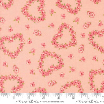 Image of Je Taime Flower Heart Blush quilting cotton fabric by Stacy Iest Hsu for Moda Fabrics. Features flowers on a pink background. Cute Little Fabric Shop.