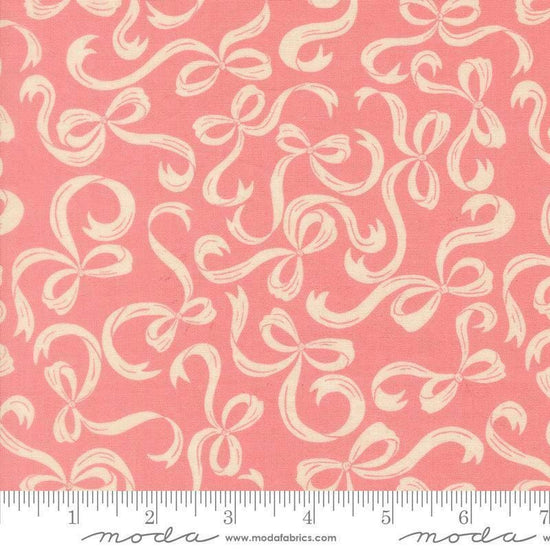 Image of Je Taime Tie a Bow Blossom quilting cotton fabric by Stacy Iest Hsu for Moda Fabrics. Features bows on a pink background. Cute Little Fabric Shop.