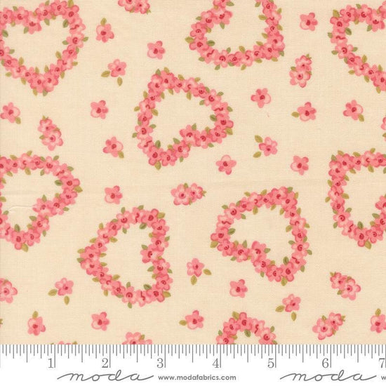 Image of Je Taime Flower Heart Lace quilting cotton fabric by Stacy Iest Hsu for Moda Fabrics. Features flowers on a cream background. Cute Little Fabric Shop.