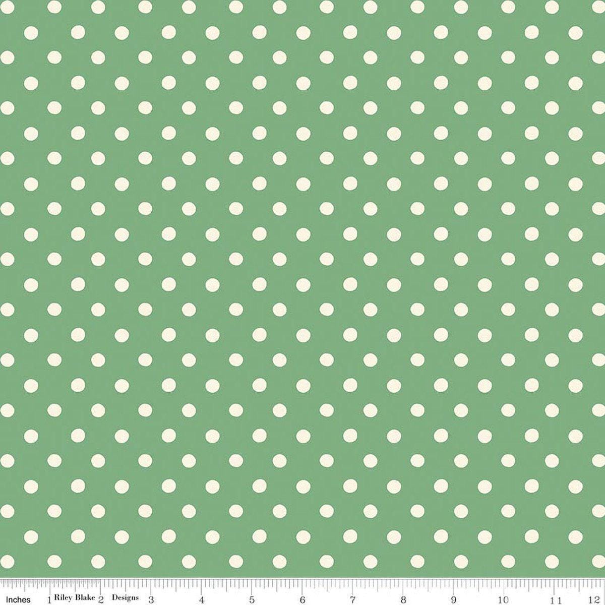 Image of Cath Kidston Signature Collection Button Spot Green by Cath Kidston for Riley Blake Designs. Features polka dots on a green background. Cute Little Fabric Shop.