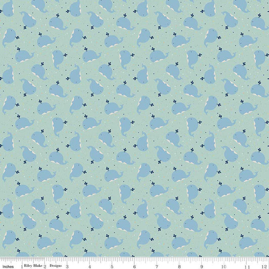 Image of Flannel Love You to the Moon Whales Powder flannel cotton fabric by Echo Park Paper Co for Riley Blake Designs. Features whales on a blue background. Cute Little Fabric Shop.