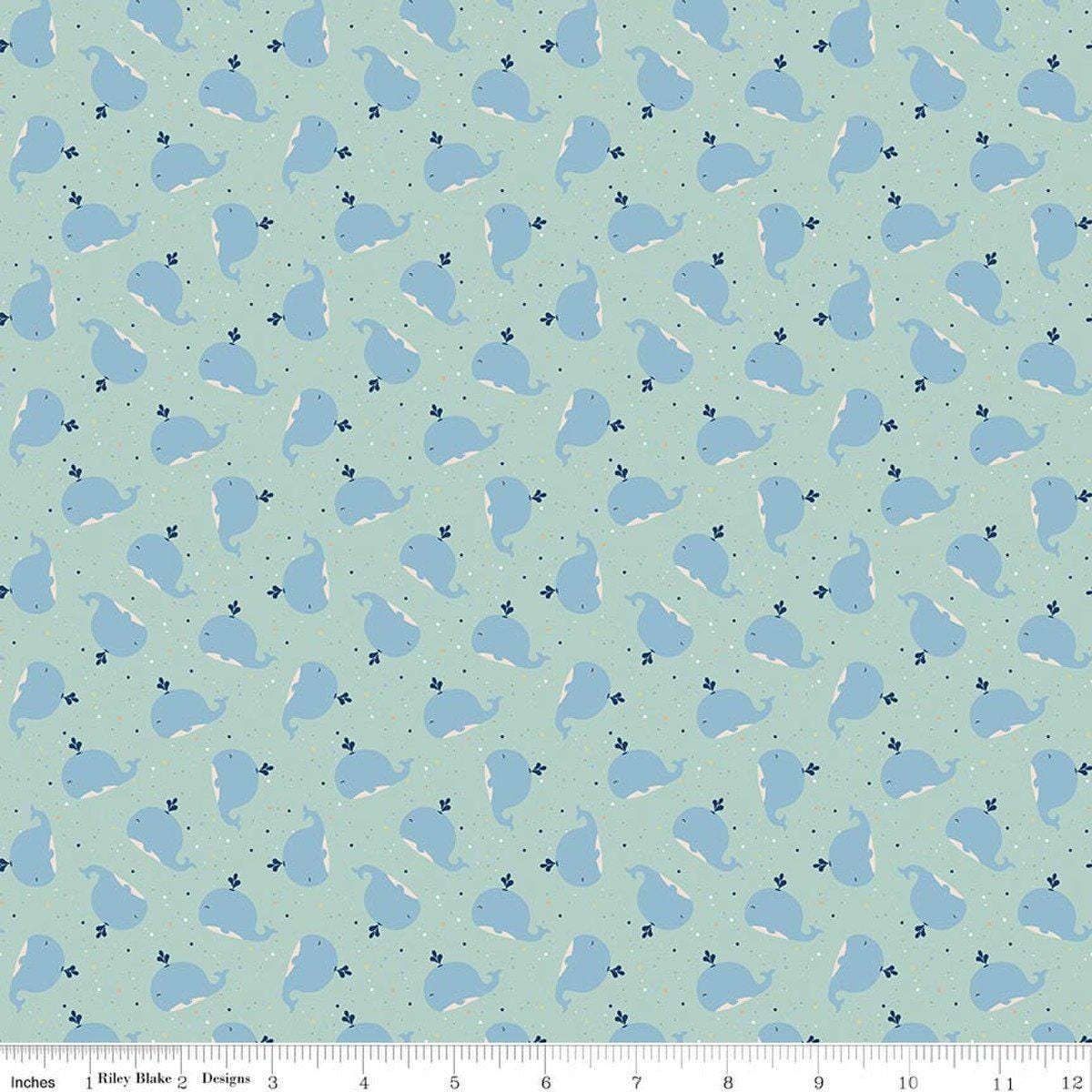 Image of Flannel Love You to the Moon Whales Powder flannel cotton fabric by Echo Park Paper Co for Riley Blake Designs. Features whales on a blue background. Cute Little Fabric Shop.