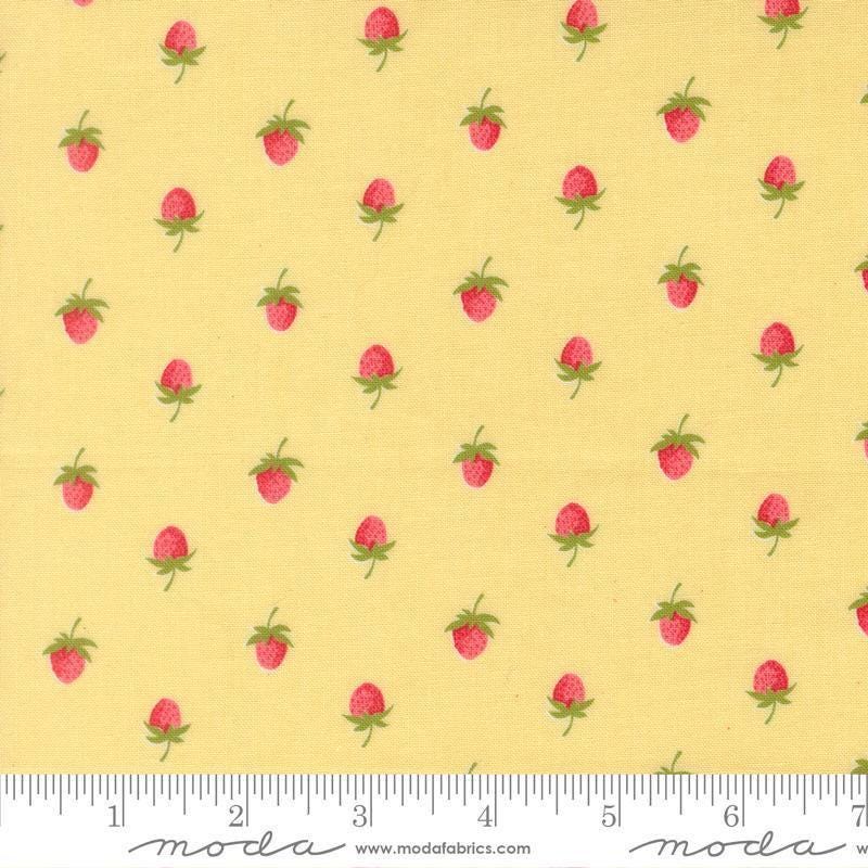 Image of Bloomsberry Berries Buttermilk quilting cotton fabric by Camille Roskelley for Moda Fabrics. Features strawberries on a yellow background. Cute Little Fabric Shop.