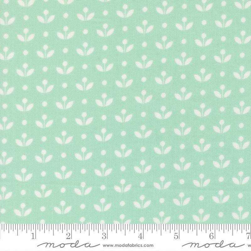 Image of Bloomsberry Mayfair Aqua quilting cotton fabric by Camille Roskelley for Moda Fabrics. Features flowers on a blue background. Cute Little Fabric Shop.