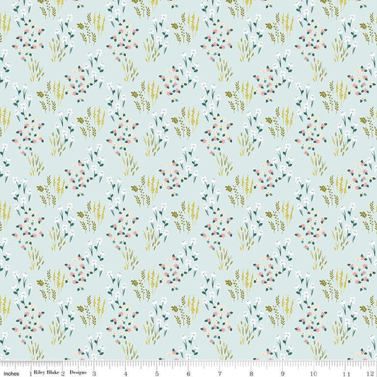 Image of Petals & Hazel Meadow Powder quilting cotton fabric by Simple Simon & Company for Riley Blake Designs. Features flowers on a blue background. Cute Little Fabric Shop.