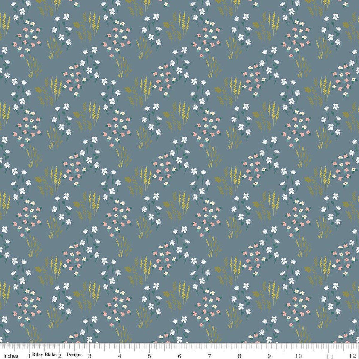 Image of Petals & Hazel Meadow Blue quilting cotton fabric by Simple Simon & Company for Riley Blake Designs. Features flowers on a blue background. Cute Little Fabric Shop.