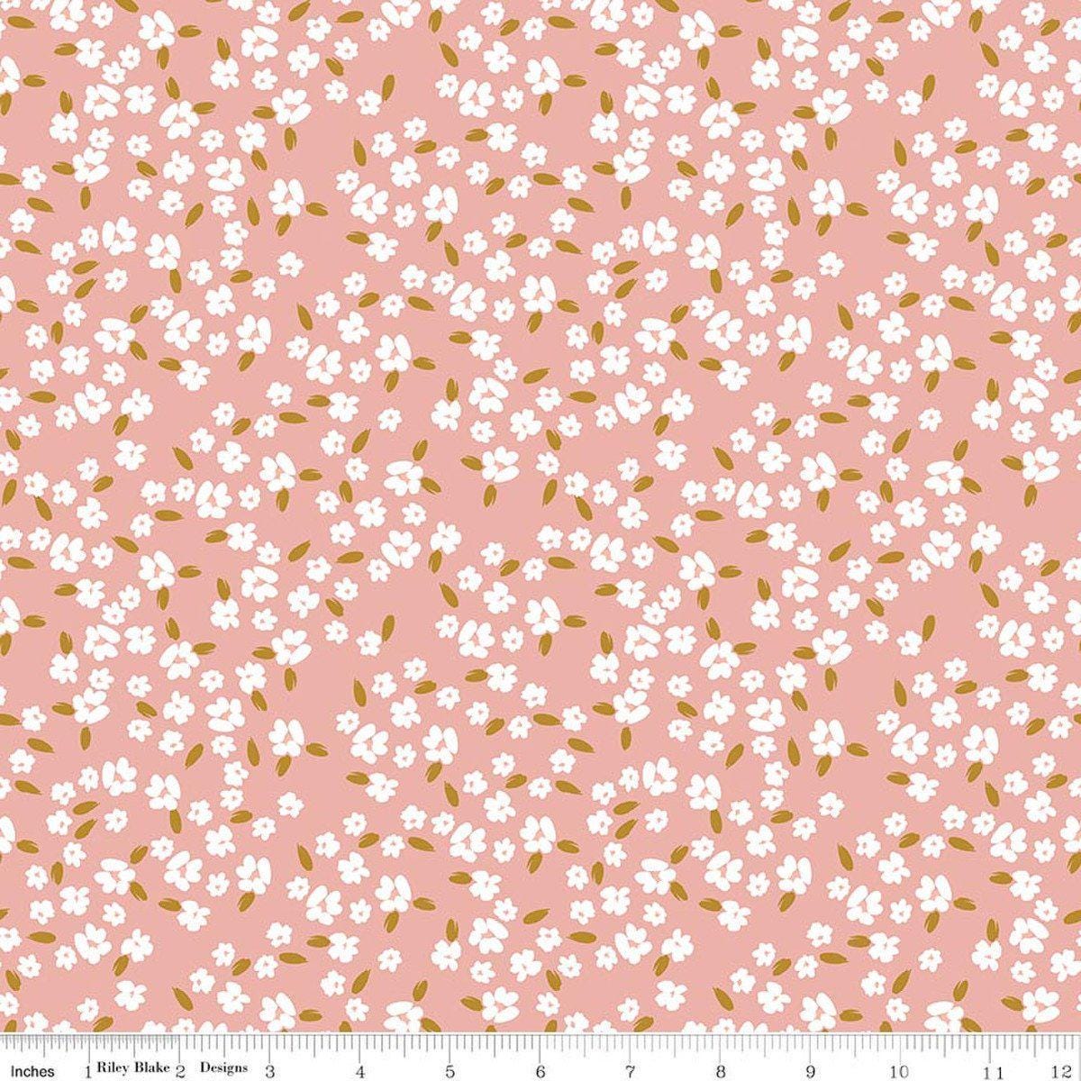 Image of Petals & Hazel Blossoms Coral quilting cotton fabric by Simple Simon & Company for Riley Blake Designs. Features flowers on a pink background. Cute Little Fabric Shop.