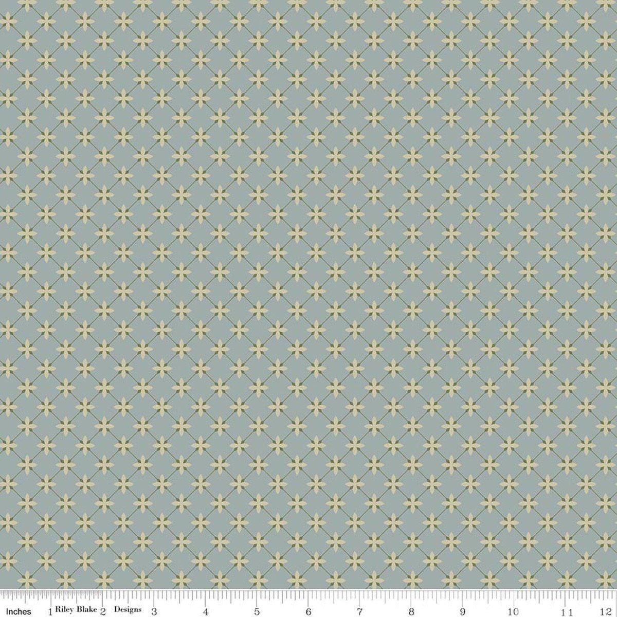 Image of Charmed & Treasured Stell Dove by Kassidy Grace for Riley Blake Designs. Features a geometric pattern on a blue background. Cute Little Fabric Shop.