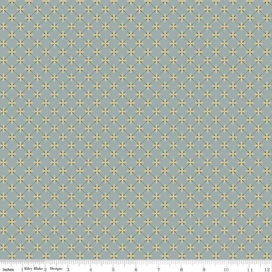 Image of Charmed & Treasured Stell Dove by Kassidy Grace for Riley Blake Designs. Features a geometric pattern on a blue background. Cute Little Fabric Shop.