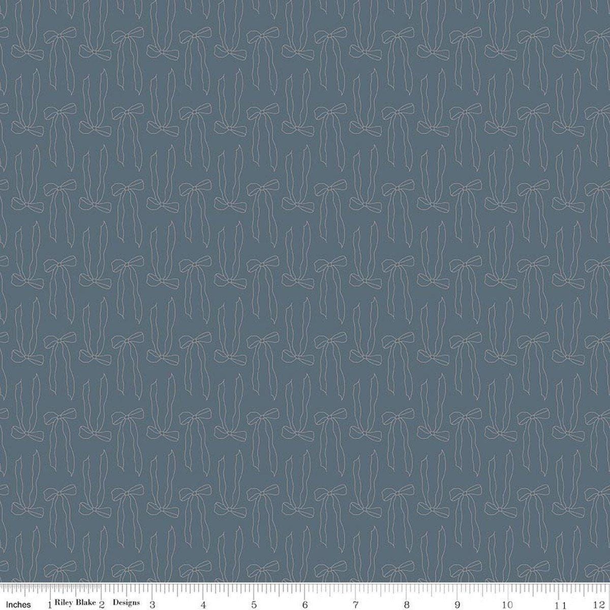 Image of Charmed & Treasured Bows Thunder by Kassidy Grace for Riley Blake Designs. Features bows on a blue background. Cute Little Fabric Shop.