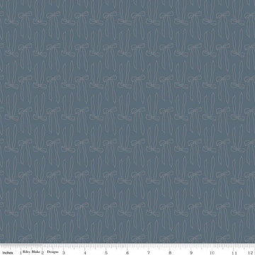 Image of Charmed & Treasured Bows Thunder by Kassidy Grace for Riley Blake Designs. Features bows on a blue background. Cute Little Fabric Shop.