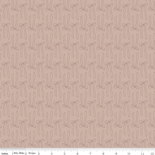 Image of Charmed & Treasured Bows Doe by Kassidy Grace for Riley Blake Designs. Features bows on a brown background. Cute Little Fabric Shop.