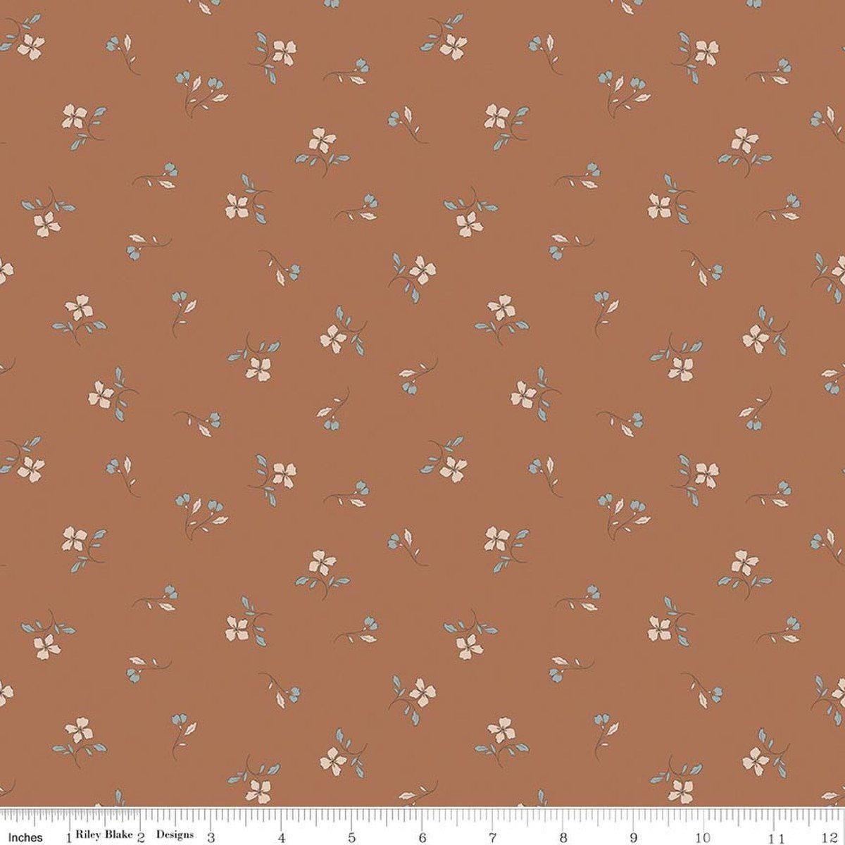 Image of Charmed & Treasured Iris Clay by Kassidy Grace for Riley Blake Designs. Features flowers on a brown background. Cute Little Fabric Shop.