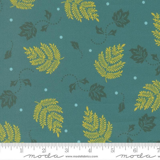 Image of Sitara Paisley Leaf Lagoon quilting cotton fabric by Crystal Manning for Moda Fabrics. Features leaves on a blue background. Cute Little Fabric Shop.