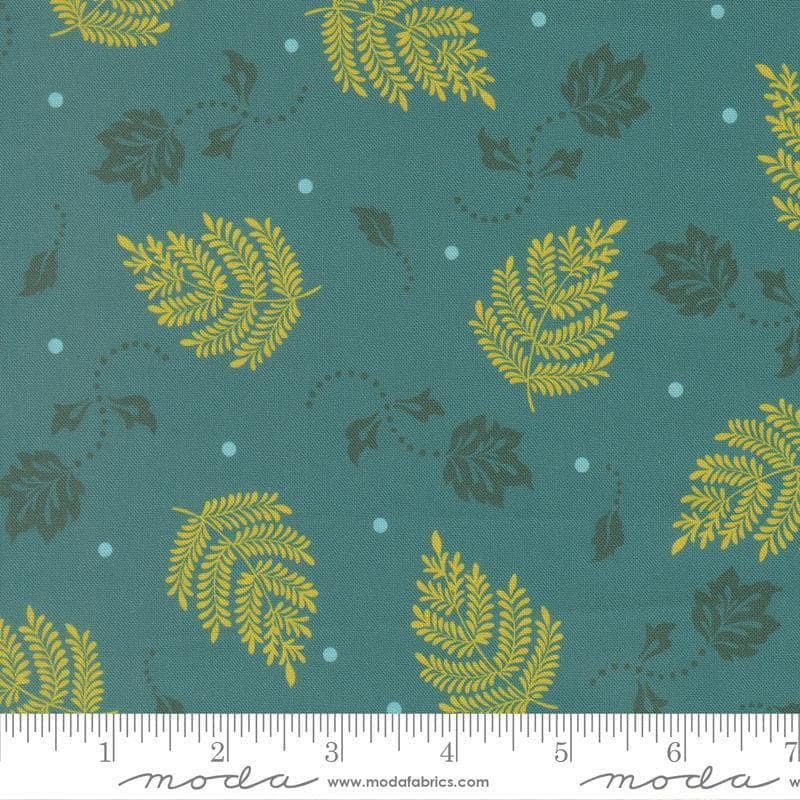 Image of Sitara Paisley Leaf Lagoon quilting cotton fabric by Crystal Manning for Moda Fabrics. Features leaves on a blue background. Cute Little Fabric Shop.
