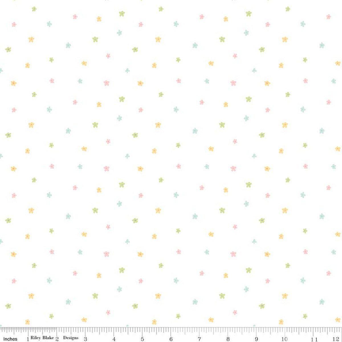 Image of Little Posies Ditsy White quilting cotton fabric by Cayla Naylor for Riley Blake Designs. Features stars on a white background. Cute Little Fabric Shop.