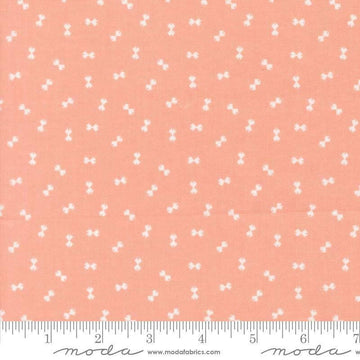 Image of Handmade Sweetness Confetti Peach quilting cotton fabric by My Sew Quilty Life for Moda Fabrics. Features bows on a pink background. Cute Little Fabric Shop.