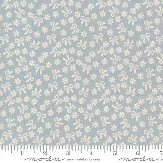Image of Handmade Sweetness Bows Powder Blue quilting cotton fabric by My Sew Quilty Life for Moda Fabrics. Features flowers on a blue background. Cute Little Fabric Shop.
