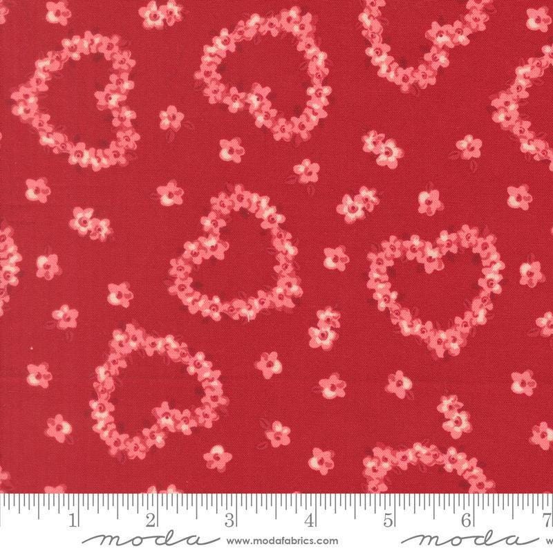 Image of Je Taime Flower Heart Rose quilting cotton fabric by Stacy Iest Hsu for Moda Fabrics. Features flowers on a red background. Cute Little Fabric Shop.