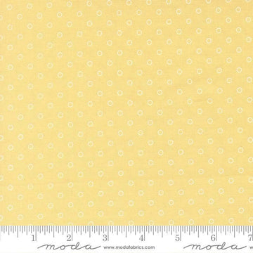 Image of Bloomsberry Favorite Dot Buttermilk quilting cotton fabric by Camille Roskelley for Moda Fabrics. Features tonal polka dots on a yellow background. Cute Little Fabric Shop.