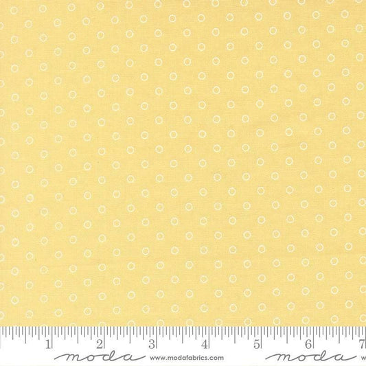Image of Bloomsberry Favorite Dot Buttermilk quilting cotton fabric by Camille Roskelley for Moda Fabrics. Features tonal polka dots on a yellow background. Cute Little Fabric Shop.