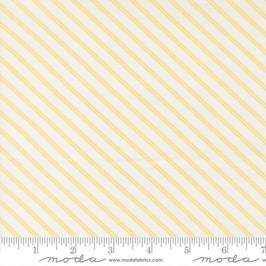 Image of Bloomsberry Stripe White Buttermilk quilting cotton fabric by Camille Roskelley for Moda Fabrics. Features stripes on a white background. Cute Little Fabric Shop.