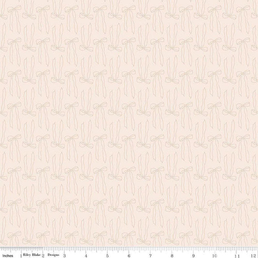 Image of Charmed & Treasured Bows Latte by Kassidy Grace for Riley Blake Designs. Features bows on a cream background. Cute Little Fabric Shop.