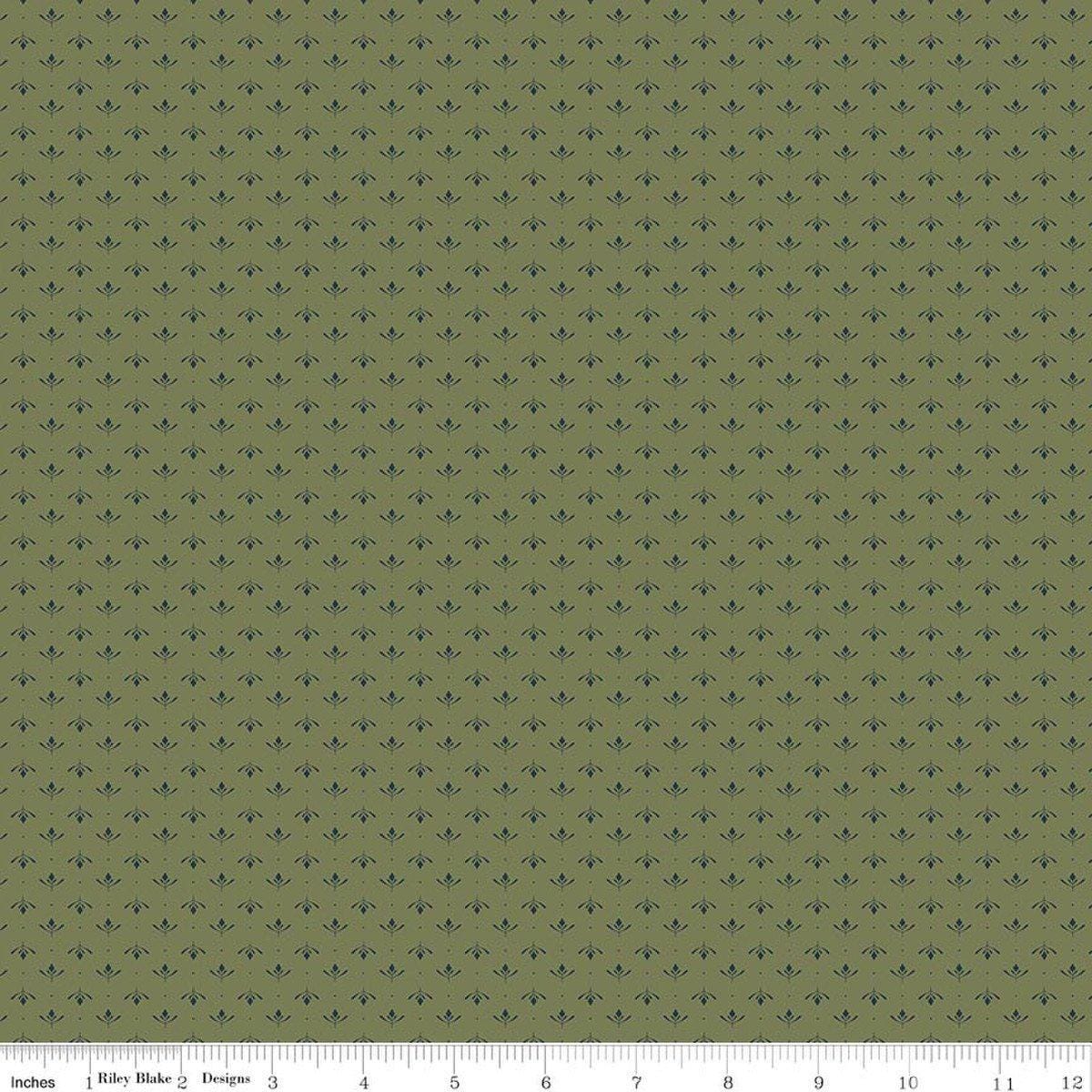 Image of Charmed & Treasured Lottie Green by Kassidy Grace for Riley Blake Designs. Features a geometric pattern on a green background. Cute Little Fabric Shop.