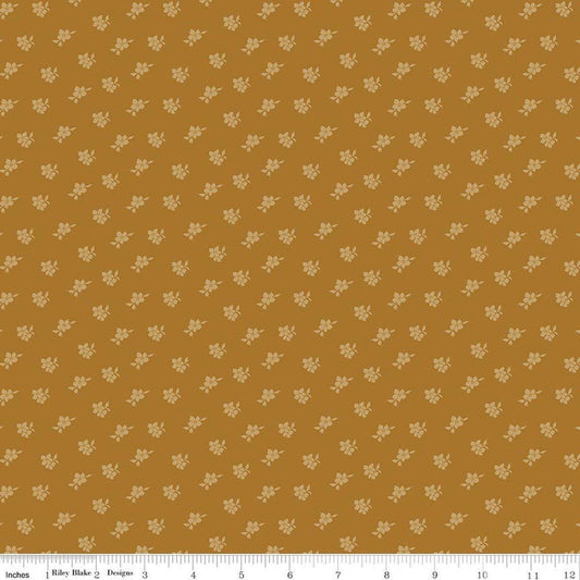 Image of Charmed & Treasured Magnolia Suede by Kassidy Grace for Riley Blake Designs. Features flowers on a gold background. Cute Little Fabric Shop.