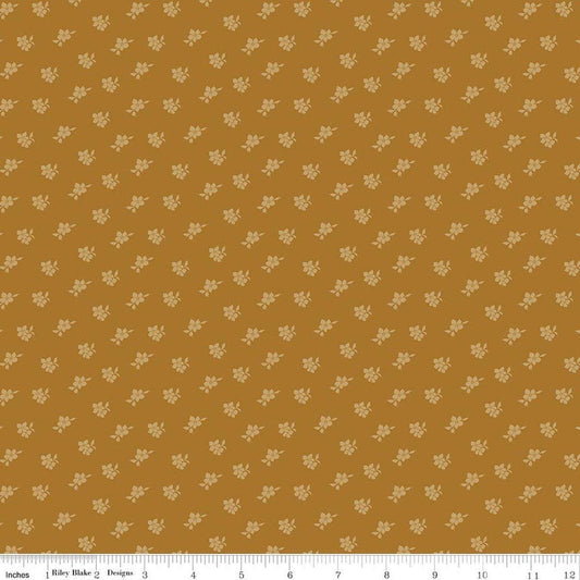 Image of Charmed & Treasured Magnolia Suede by Kassidy Grace for Riley Blake Designs. Features flowers on a gold background. Cute Little Fabric Shop.