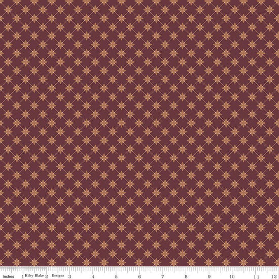 Image of Charmed & Treasured Stella Mahogany by Kassidy Grace for Riley Blake Designs. Features a geometric pattern on a reddish brown background. Cute Little Fabric Shop.