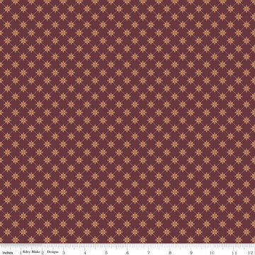 Image of Charmed & Treasured Stella Mahogany by Kassidy Grace for Riley Blake Designs. Features a geometric pattern on a reddish brown background. Cute Little Fabric Shop.