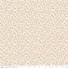 Image of Charmed & Treasured Evergreen Latte by Kassidy Grace for Riley Blake Designs. Features leaves on a cream background. Cute Little Fabric Shop.