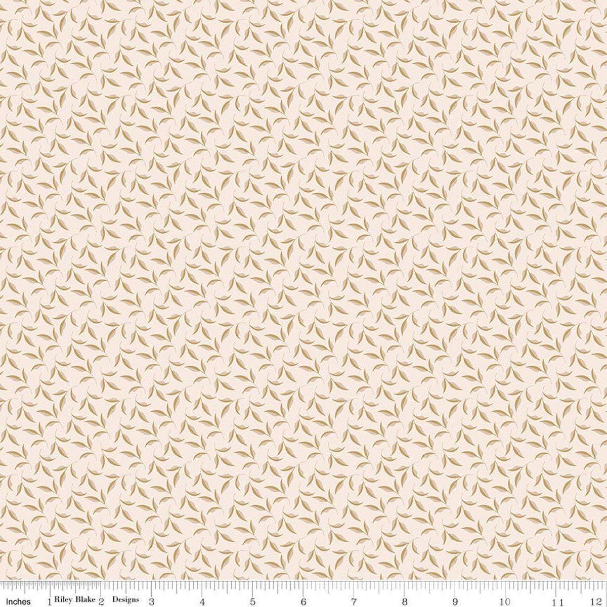 Image of Charmed & Treasured Evergreen Latte by Kassidy Grace for Riley Blake Designs. Features leaves on a cream background. Cute Little Fabric Shop.
