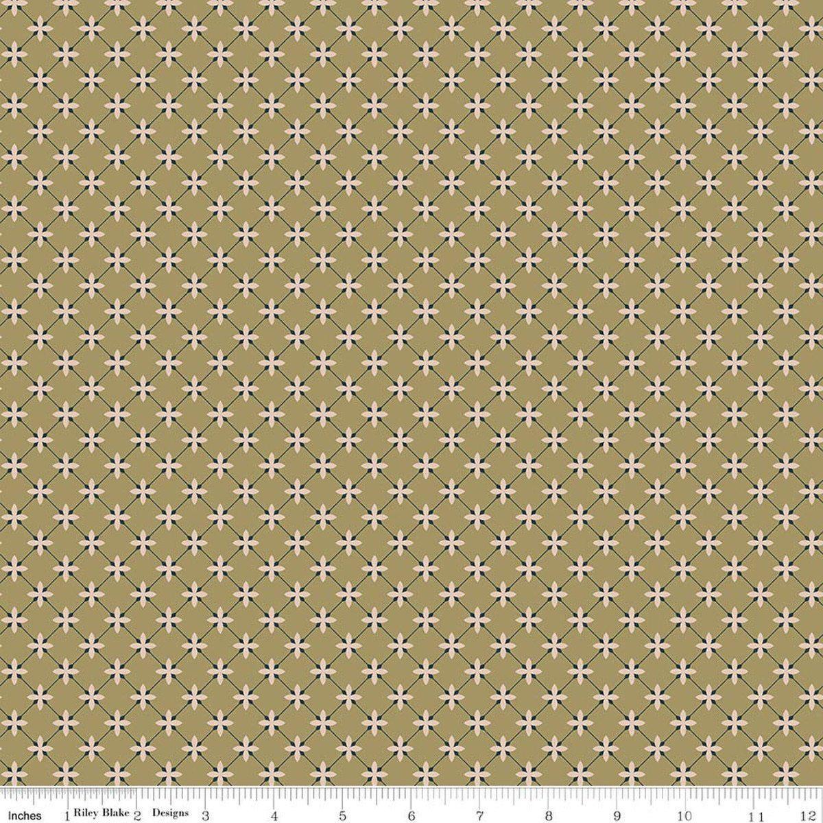 Image of Charmed & Treasured Stella Lemongrass by Kassidy Grace for Riley Blake Designs. Features a geometric pattern on a green background. Cute Little Fabric Shop.