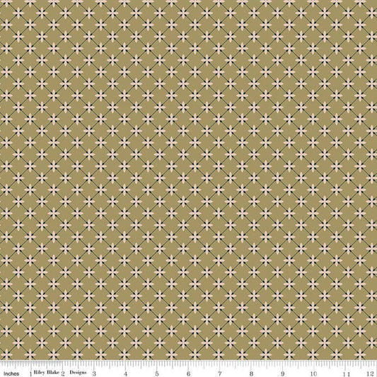 Image of Charmed & Treasured Stella Lemongrass by Kassidy Grace for Riley Blake Designs. Features a geometric pattern on a green background. Cute Little Fabric Shop.