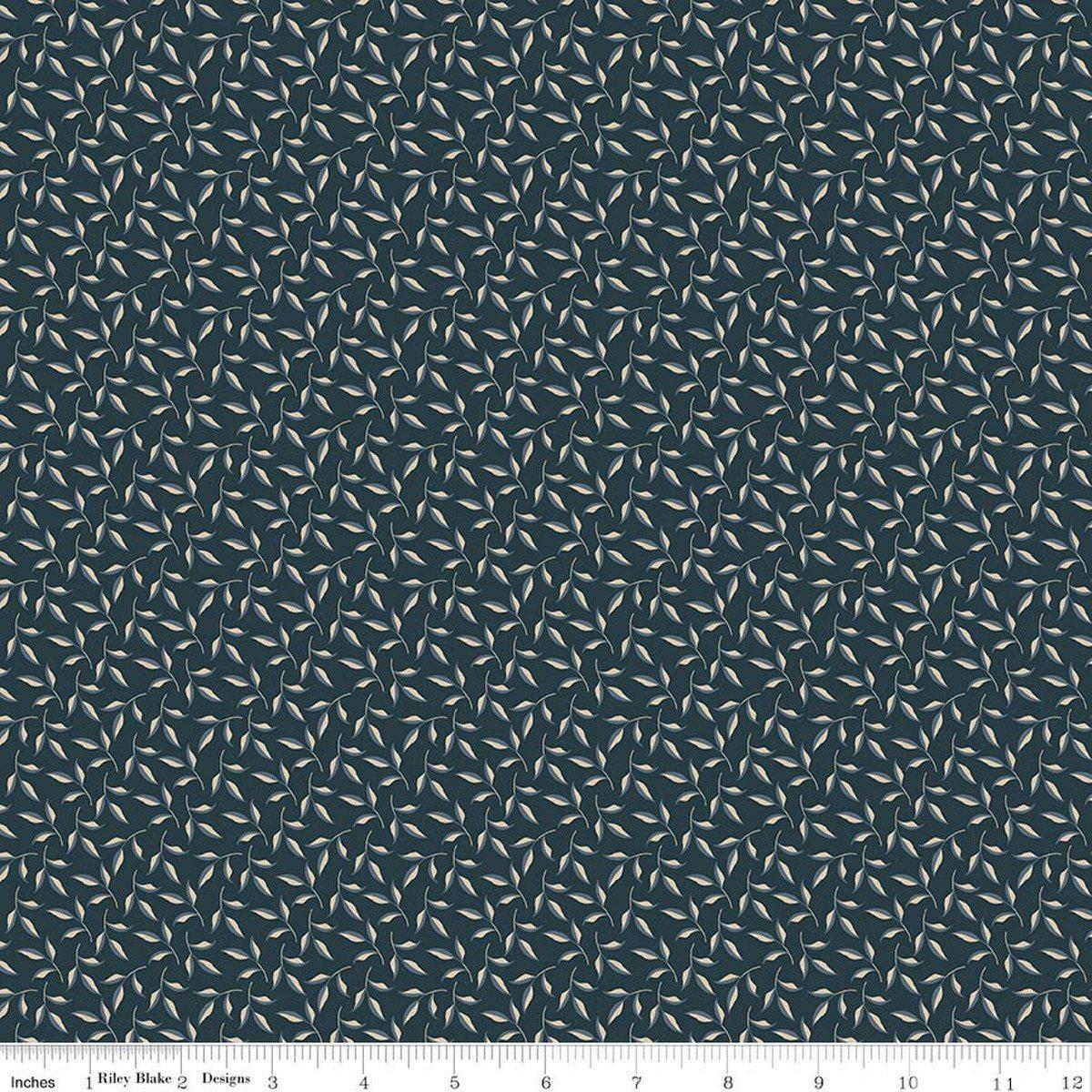 Image of Charmed & Treasured Evergreen Carbon by Kassidy Grace for Riley Blake Designs. Features leaves on a blue background. Cute Little Fabric Shop.
