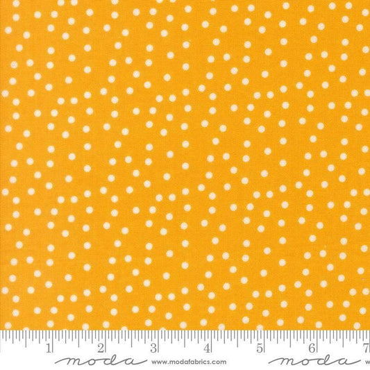 Image of Makers Delight Small Dot Chrome by Chrissy Lux for Moda Fabrics. Features polka dots on a yellow background. Cute Little Fabric Shop.