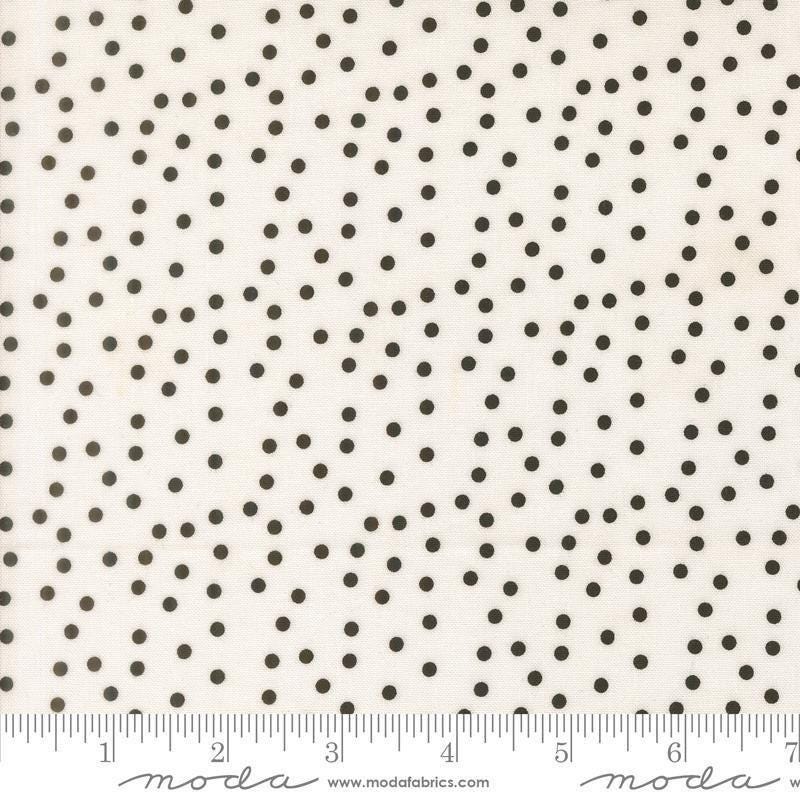Image of Makers Delight Small Dot White Black by Chrissy Lux for Moda Fabrics. Features polka dots on a white background. Cute Little Fabric Shop.